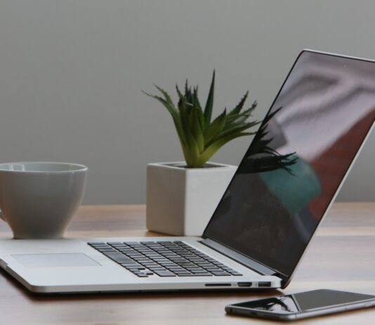 Top cheapest Gaming Laptops macbook-pro-iphone-cup-desk-7974